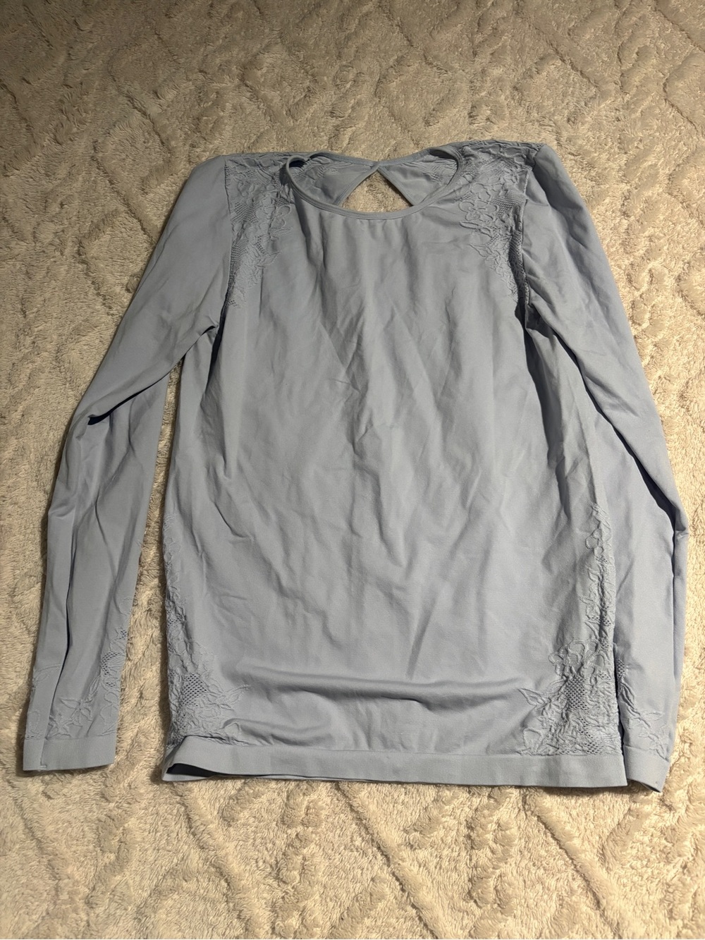 Blue women’s work out longsleeve no size tag fits a large